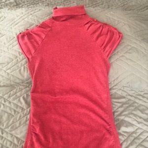 Capped sleeve turtleneck blouse